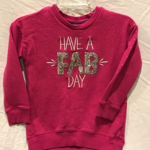 Girls long sleeved shirt. Size 7-8